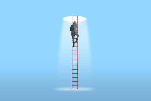 A man climbs a tall red ladder that leads to a hole in the ceiling above him. A bright light emanates from the hole above.