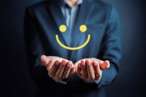 istock Customer Satisfaction Survey, Businessman holding Smile icon satisfaction, service experience rating online application, customer evaluation product service quality, satisfaction feedback review. 1481286870