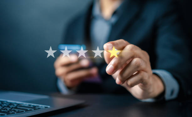 Customer Satisfaction Survey, Businessman holding Smile icon satisfaction, service experience rating online application, customer evaluation product service quality, satisfaction feedback review.