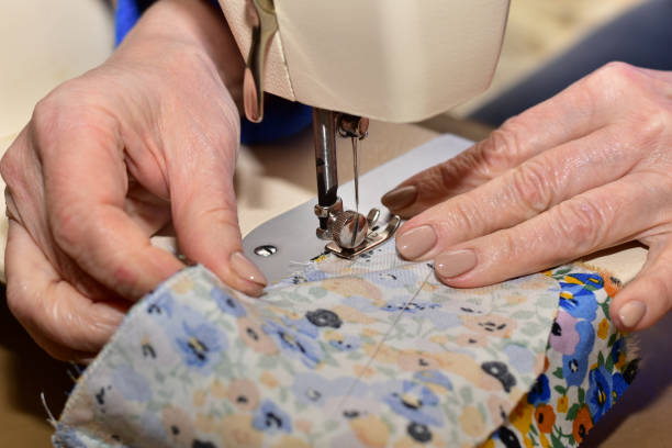 istock Moment of a seamstress working on a sewing machine. 1481288556