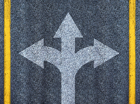 Road with three direction arrow choices top view, creative artwork