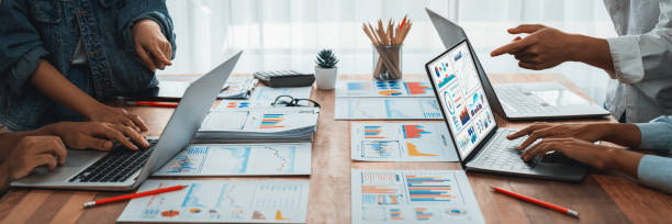 istock Analyst team utilizing BI Fintech to analyze financial report. Scrutinize 1481305890