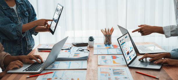 istock Analyst team utilizing BI Fintech to analyze financial report. Scrutinize 1481305913