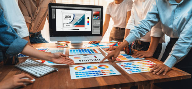 istock Graphic designer brainstorming logo and graphic arts at workshop. Scrutinize 1481307082