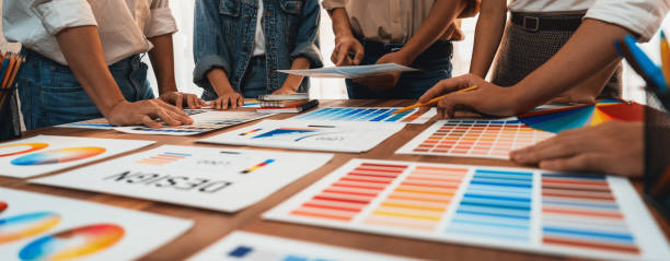 istock Graphic designer brainstorming logo and graphic arts at workshop. Scrutinize 1481307180