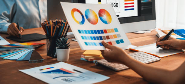 istock Graphic designer works on computer laptop with digital pen. Scrutinize 1481307522