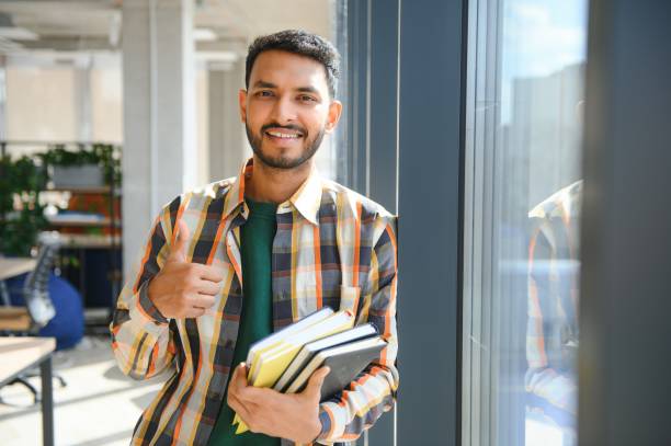 istock Happy indian male student at the university 1481307622