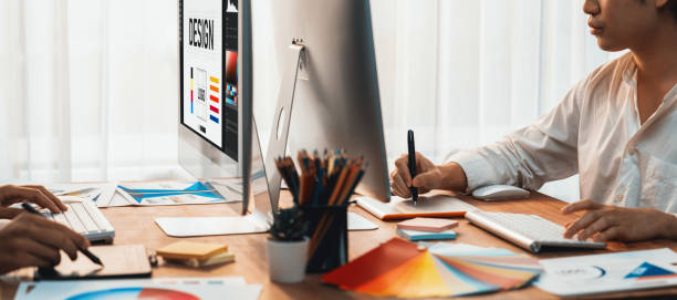 istock Graphic designer works on computer laptop with digital pen. Scrutinize 1481308257