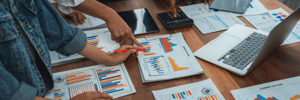 istock Analyst team utilizing BI Fintech to analyze financial dashboard. Scrutinize 1481309712