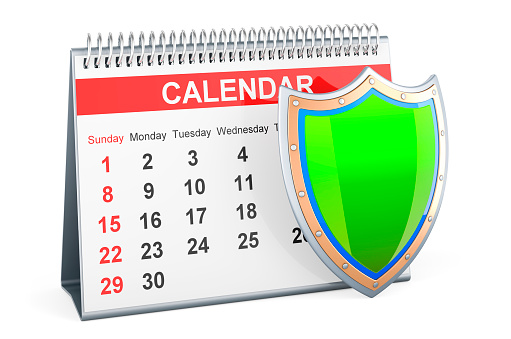 Desk calendar with shield, 3D rendering isolated on white background