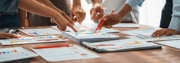 istock Analyst team utilizing BI Fintech to analyze financial dashboard. Scrutinize 1481312349