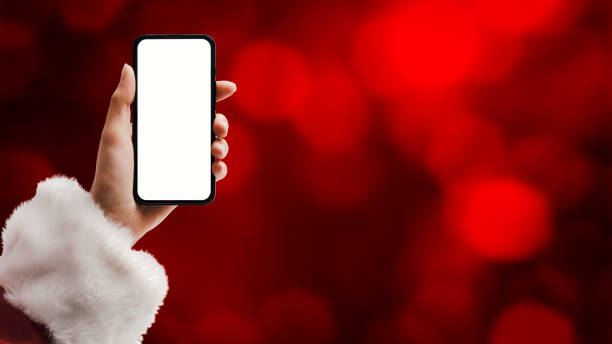 istock Santa Claus holding a smartphone 1481315048