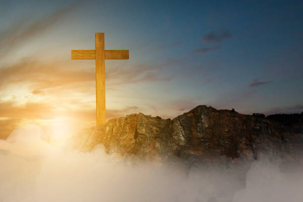 istock Christian Cross on the rock hill 1481315133