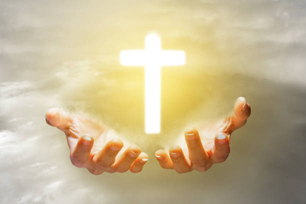 istock Human hand showing Christian cross 1481315220