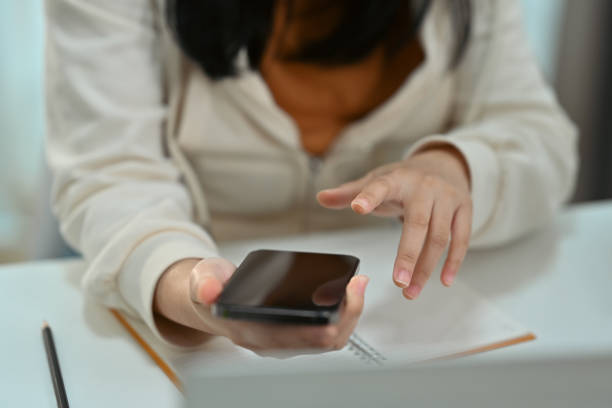 istock Young woman hand texting text message on mobile phone. Communication, technology and lifestyle concept. 1481319082