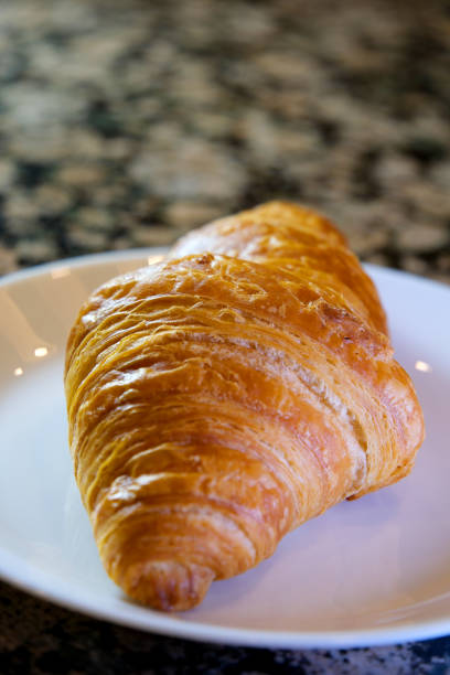 istock Croissants baking timelapse. One hand made croissants cooking 1481319345