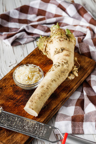istock aromatic horseradish root on a white rustic wooden background 1481319810