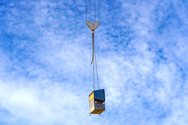 istock Lifting metal box at construction site at Swiss town. 1481320515