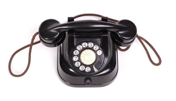 istock Old black telephone set on a white background 1481321481