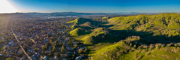 Wallnut Creek Aerial Panorama. Suburban city and green hills at sunset
USA America
Drone