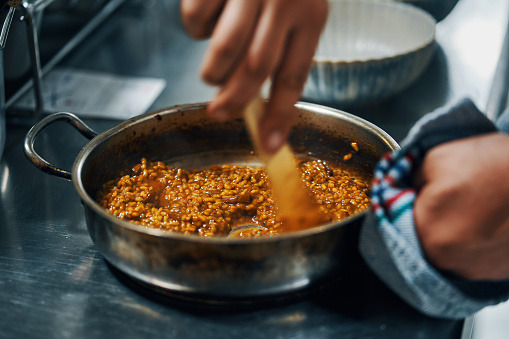 Preparing a rice paella