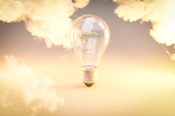 istock retro style lightbulb with glowing filament standing on infinite colorful background; creativity design concept; 3D Illustration 1481328029