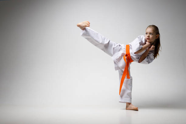 istock Teaching children self-defense in karate. 1481328162