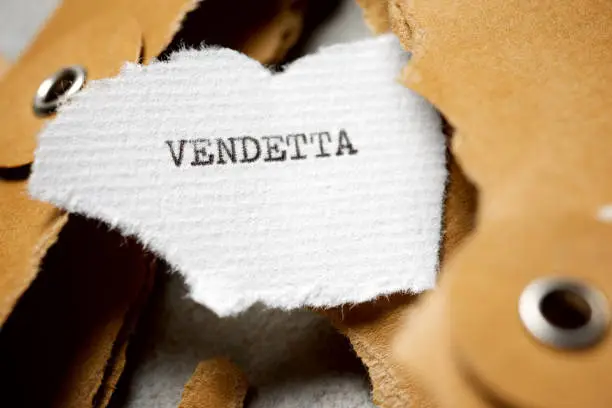 Vendetta text written on a small piece of paper