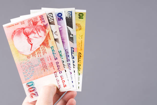 istock Old Israeli money in hand 1481330271