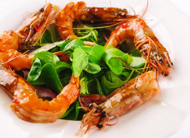 istock Fresh shrimp salad close-up on plate 1481330605