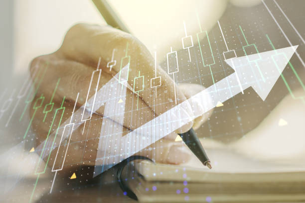 istock Abstract creative financial graph with upward arrow and woman hand writing in notebook on background, forex and investment concept. Multiexposure 1481330620