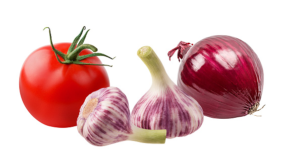 Garlics, tomato and red onion isolated on white background