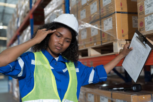 istock African American female warehouse worker working with stressed feeling, worry, boring or unhappy in warehouse. Upset woman worker at work. Unhappy black female worker working in storehouse 1481331687
