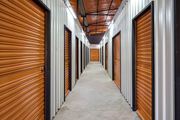 istock Corridor of self storage unit with yellow doors. Rental Storage Units 1481332732