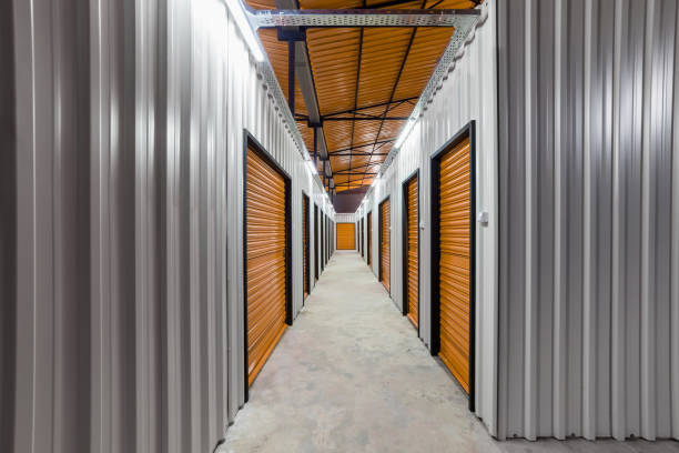 istock Corridor of self storage unit with yellow doors. Rental Storage Units 1481332736