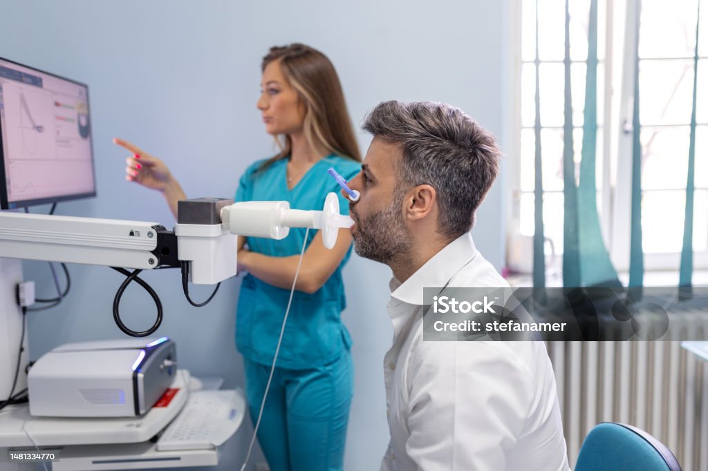Man Testing Man Testing Breathing Function By Spirometry Diagnosis Of Respiratory ...