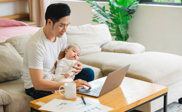 istock image of asian father and son at home 1481336072
