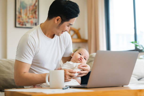 istock image of asian father and son at home 1481336085