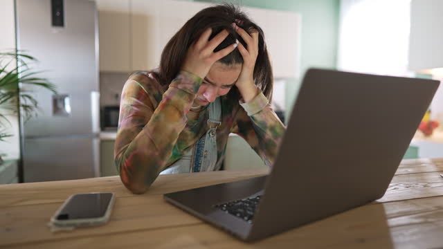 Teenage girl being cyberbullied