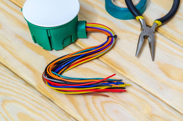 istock Electrical junction box with wires and tool usually used in the electric installation process 1481336977