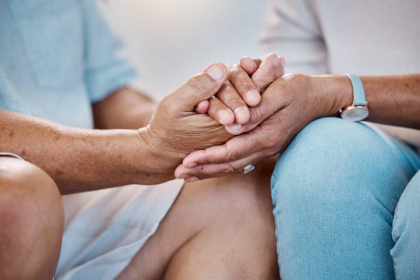 istock Senior couple hand holding, support and empathy, trust or helping for mental health problem, death news or therapy. Love, depression and people hands together for psychology, retirement or healthcare 1481337200