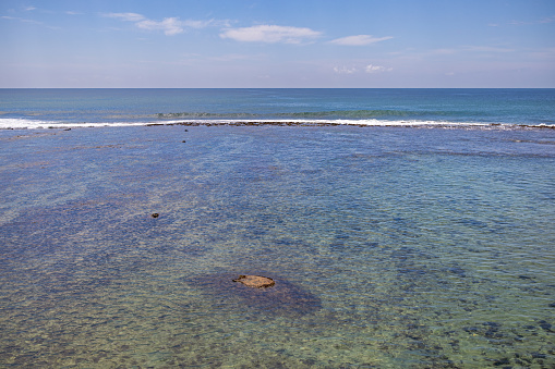 View over the rocky beach surrounding the old town Galle the most southern city in Sri Lanka