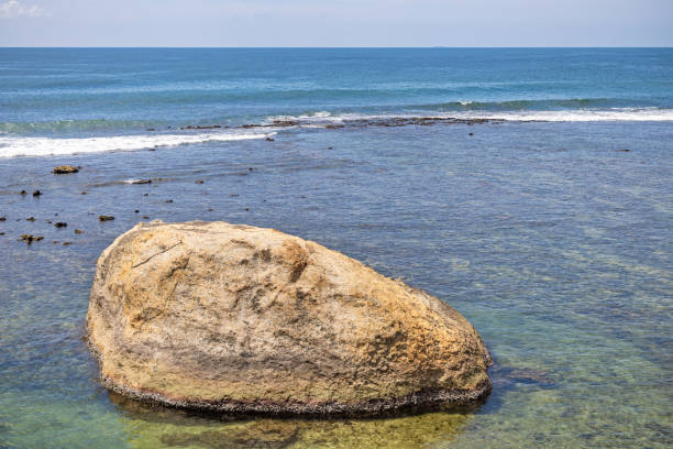 View over the rocky beach surrounding the old town Galle the most southern city in Sri Lanka