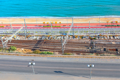 Railroad near the sea shore . Train station at sea coast