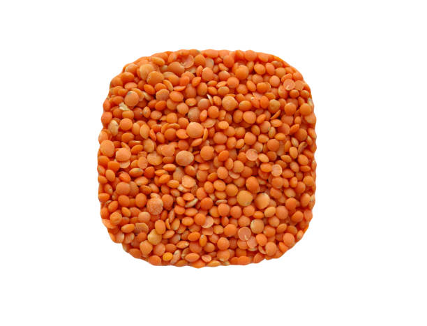 Red lentils square from above isolated on white stock photo