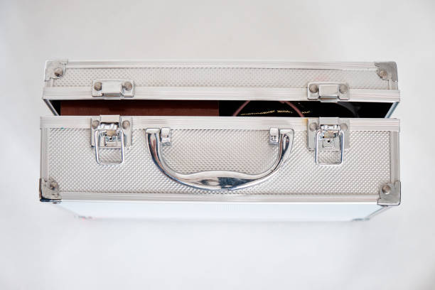 istock Weathered metal aluminum suitcase isolated on white background. Protection and security concept 1481348773