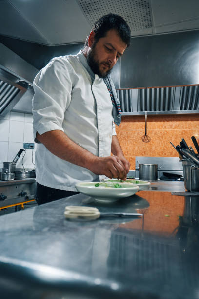 istock chef preparing cream of peas 1481348778