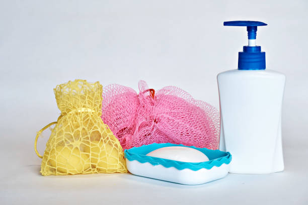 Three different sweet pink washcloths for spa treatments on a white background. Space for text