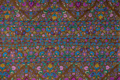 Detail handmade pashmina shawl with delicate embroidery. Close up. Srinagar, India
