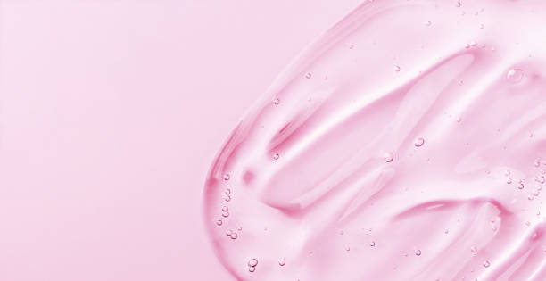 istock Serum gel smear on pink background. 1481351772